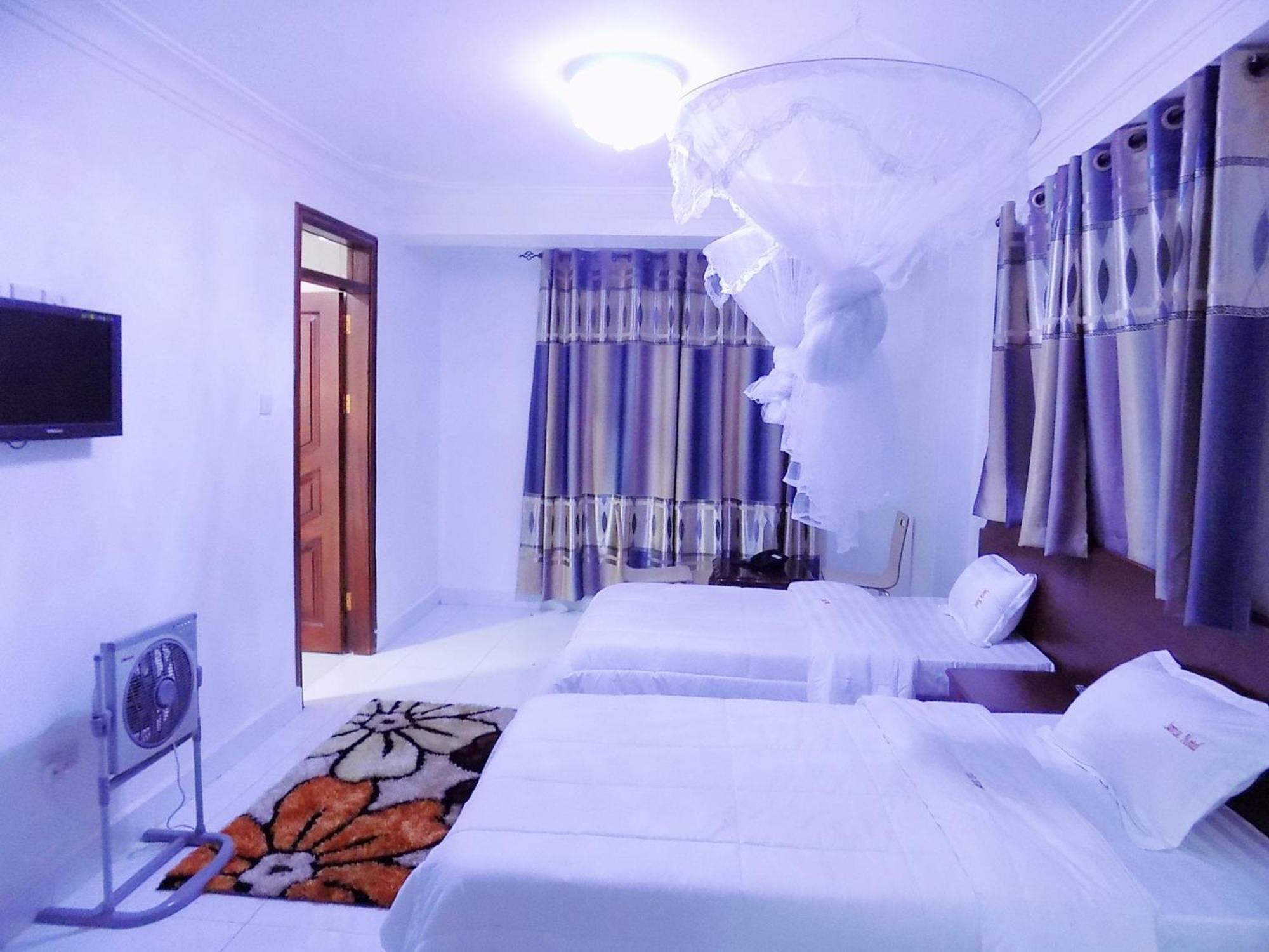 Sunrise Hotel Кампала Стая снимка