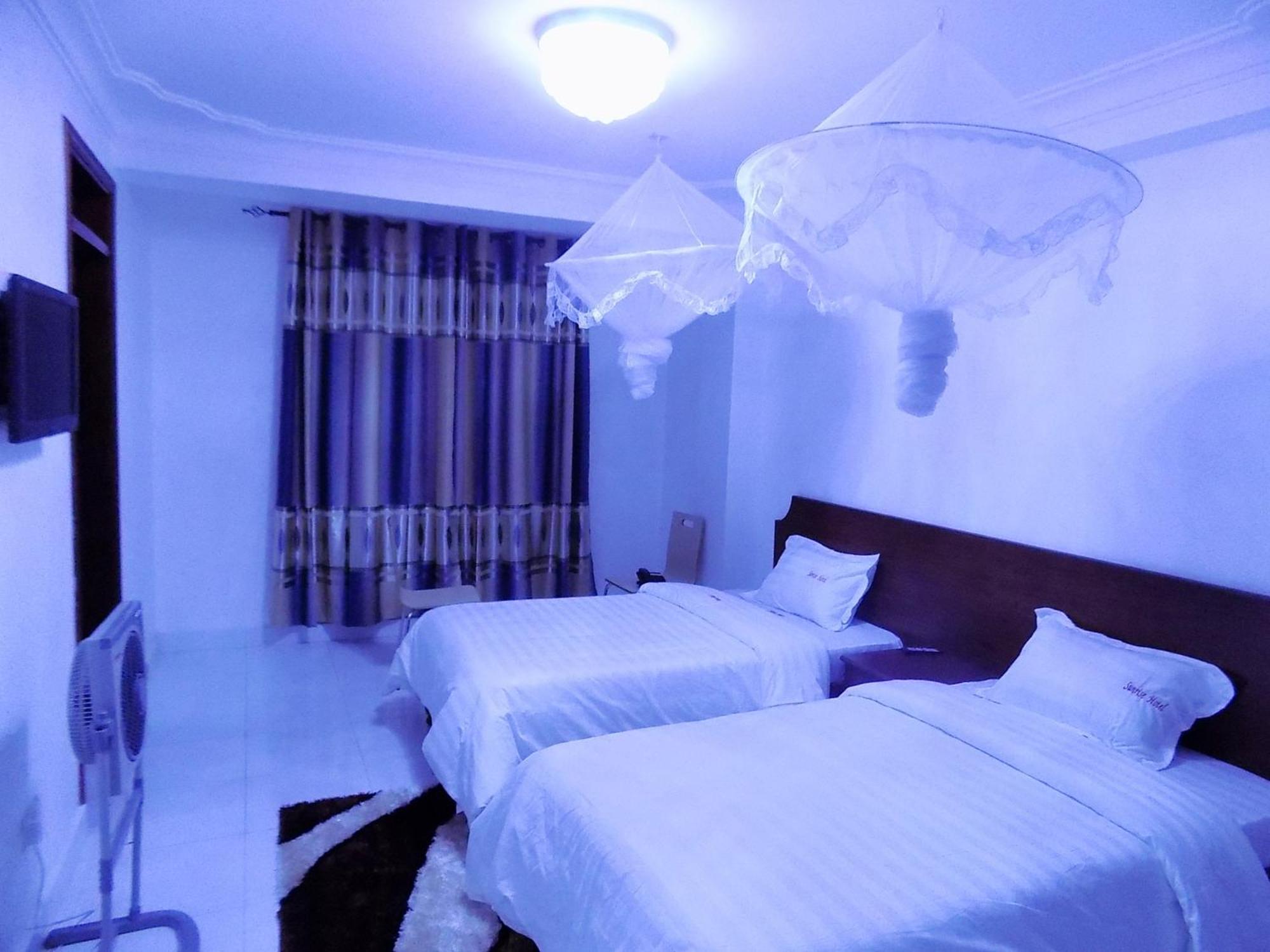 Sunrise Hotel Кампала Стая снимка